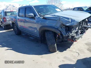 2023 Nissan Frontier SV with VIN 1N6ED1EK2PN633278, listed as a IAAI auction lot 41854671 with 59,549 mi miles and . Bid and sale history available at DreamBid. Image 1.