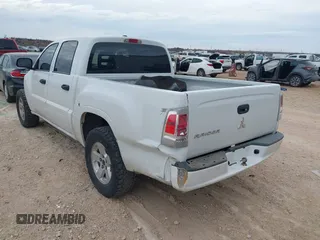 2007 Mitsubishi Raider LS with VIN 1Z7HC28K87S174381, listed as a IAAI auction lot 41364658 with 156,976 mi miles. Bid and sale history available at carsss.com. Image 3.