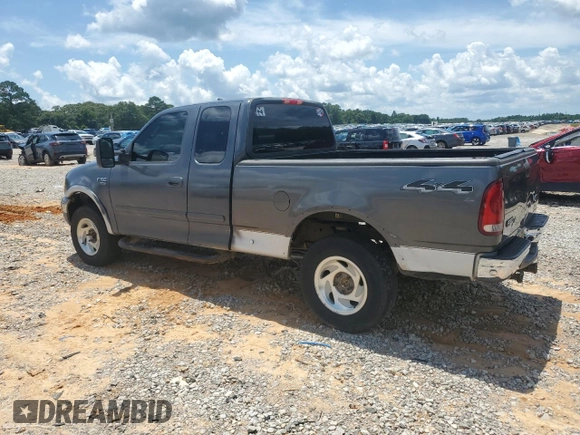 2002 Ford F-150 XL z VIN 1FTRX18L52NB59531, wystawiony jako Copart lot #58550365 z przebiegiem 267 424 mil mil oraz Szkoda całkowita • Salvage title. Historia ofert i sprzedaży dostępna na DreamBid. Obrazek 2.