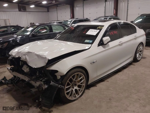 2016 BMW 5 Series 550i xDrive with VIN WBAKP9C50GD980460, listed as a IAAI auction lot 41847849 with 101,000 mi miles. Bid and sale history available at carsss.com. Image 2.