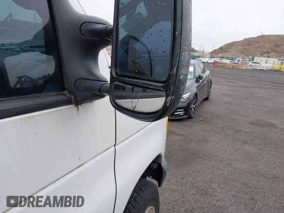 2007 Ford Econoline Cargo Commercial with VIN 1FTNE24W57DB33258, listed as a IAAI auction lot 42393068 with 152,700 mi miles and . Bid and sale history available at DreamBid. Image 13.