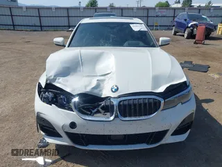 2019 BMW 3 Series 330i xDrive with VIN WBA5R7C52KAJ82760, listed as a IAAI auction lot 42485304 with 43,298 mi miles and . Bid and sale history available at DreamBid. Image 12.