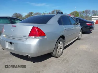 2014 Chevrolet Impala LS with VIN 2G1WA5E38E1121693, listed as a IAAI auction lot 41814213 with 129,255 mi miles and . Bid and sale history available at DreamBid. Image 4.