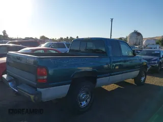 1999 Dodge Ram 2500 with VIN 3B7KC23Z5XG118959, listed as a IAAI auction lot 40484594 with 176,946 mi miles. Bid and sale history available at carsss.com. Image 4.
