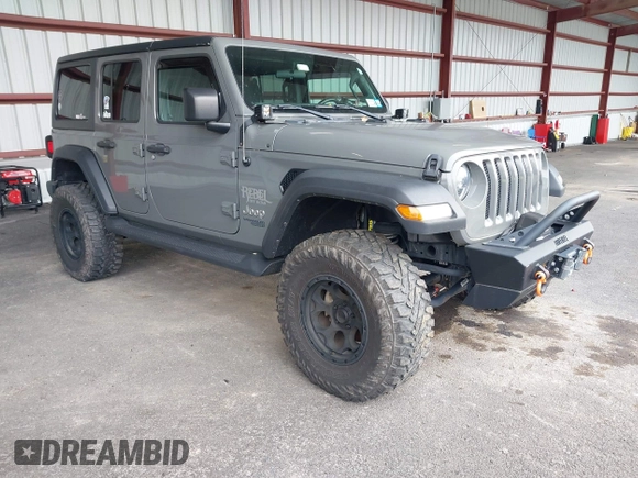 2021 Jeep Wrangler Unlimited Sport S z VIN 1C4HJXDG2MW542087, wystawiony jako IAAI lot #41893734 z przebiegiem 57 000 mil mil oraz . Historia ofert i sprzedaży dostępna na DreamBid. Obrazek 1.