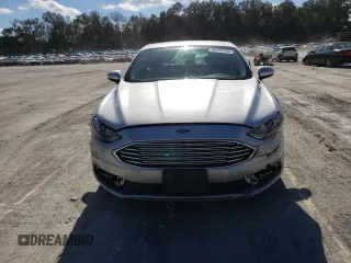 2018 Ford Fusion Hybrid SE with VIN 3FA6P0LU6JR235451, listed as a Copart auction lot 36202453 with 116,180 mi miles. Bid and sale history available at carsss.com. Image 5.