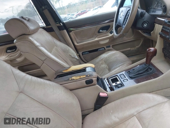 2000 BMW 7 Series 740iL with VIN WBAGH8343YDP13075, listed as a IAAI auction lot 42050589 with 999,999 mi miles. Bid and sale history available at carsss.com. Image 5.