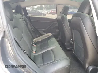 2020 Tesla Model 3 Standard Range Plus with VIN 5YJ3E1EA6LF614045, listed as a Copart auction lot 65222584 with 59,823 mi miles and Salvage Title. Bid and sale history available at DreamBid. Image 10.