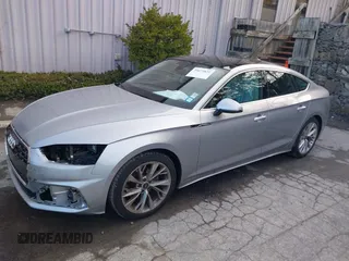 2024 Audi A5 Sportback Premium z VIN WAUABCF57RA023069, wystawiony jako IAAI lot #39079825 z przebiegiem 2 810 mil mil oraz . Historia ofert i sprzedaży dostępna na DreamBid. Obrazek 22.