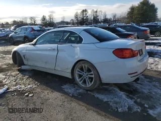 2015 BMW 4 Series 428i with VIN WBA3V7C54FP772674, listed as a Copart auction lot 88060515 with 95,980 mi miles and Salvage Title. Bid and sale history available at carsss.com. Image 2.