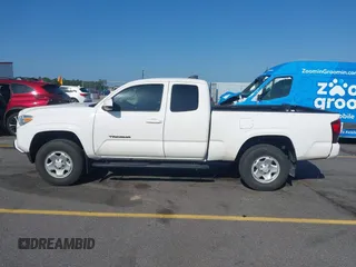 2021 Toyota Tacoma SR with VIN 3TYRX5GN4MT009048, listed as a IAAI auction lot 42291313 with 26,197 mi miles and . Bid and sale history available at DreamBid. Image 14.