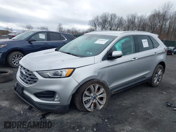 2019 Ford Edge Titanium with VIN 2FMPK4K95KBB55619, listed as a IAAI auction lot 42048941 with 89,999 mi miles. Bid and sale history available at carsss.com. Image 2.