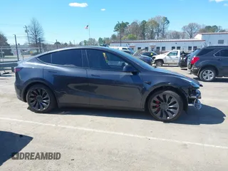 2024 Tesla Model Y Performance with VIN 7SAYGDEF1RA329825, listed as a IAAI auction lot 41762602 with 3,923 mi miles and . Bid and sale history available at DreamBid. Image 14.