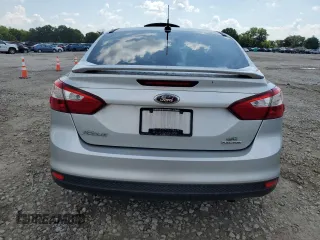 2013 Ford Focus SE with VIN 1FADP3F25DL106039, listed as a Copart auction lot 63492965 with 113,553 mi miles and Salvage title. Bid and sale history available at DreamBid. Image 6.