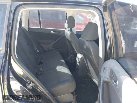 2013 Volkswagen Tiguan S z VIN WVGAV3AXXDW594680, wystawiony jako IAAI lot #41652323 z przebiegiem 136 382 mil mil oraz . Historia ofert i sprzedaży dostępna na DreamBid. Obrazek 8.