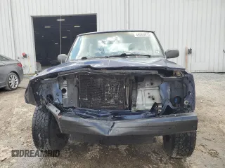 1997 Jeep Cherokee SE with VIN 1J4FT27P0VL612859, listed as a Copart auction lot 49869915 with 198,702 mi miles and Salvage title. Bid and sale history available at DreamBid. Image 5.