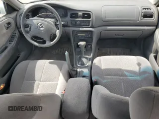 2000 Mazda 626 LX z VIN 1YVGF22C3Y5165341, wystawiony jako Copart lot #56575075 z przebiegiem 58 645 mil mil oraz Szkody całkowita. Historia ofert i sprzedaży dostępna na DreamBid. Obrazek 8.