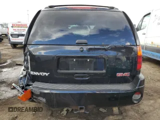 2005 GMC Envoy SLT with VIN 1GKDT13S352366014, listed as a Copart auction lot 43006165 with 126,721 mi miles and Clean Title. Bid and sale history available at carsss.com. Image 6.