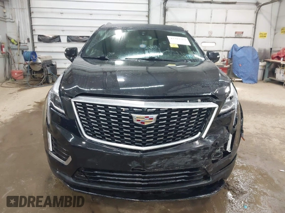 2022 Cadillac XT5 FWD Luxury with VIN 1GYKNAR47NZ100356, listed as a IAAI auction lot 42393314 with 91,492 mi miles and . Bid and sale history available at DreamBid. Image 12.