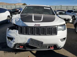 2021 Jeep Grand Cherokee Trailhawk with VIN 1C4RJFLG3MC646573, listed as a Copart auction lot 82687014 with 83,294 mi miles and Salvage Title. Bid and sale history available at carsss.com. Image 5.