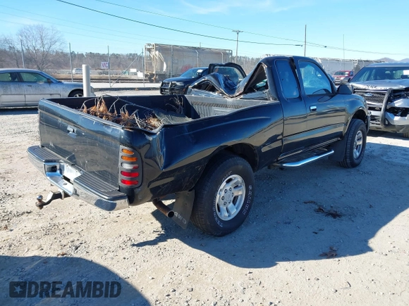 1998 Toyota Tacoma with VIN 4TAWN72N2WZ056597, listed as a IAAI auction lot 41636584 with 147,695 mi miles and . Bid and sale history available at DreamBid. Image 4.