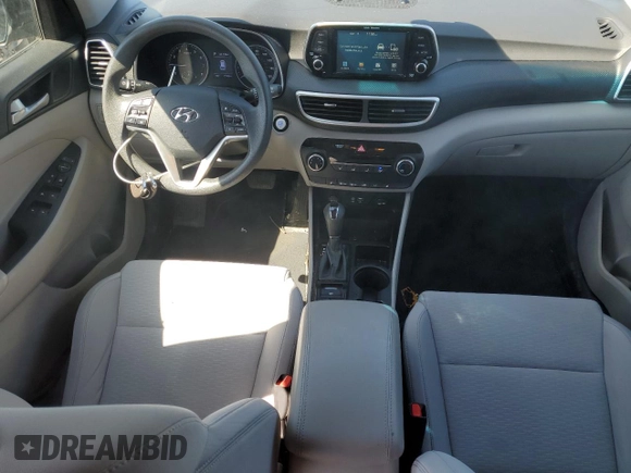 2019 Hyundai Tucson Value with VIN KM8J33A43KU888877, listed as a Copart auction lot 52191305 with 77,204 mi miles and Salvage title. Bid and sale history available at DreamBid. Image 8.