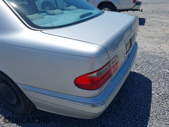 2002 Mercedes-Benz E-Class with VIN WDBJF65J72B441380, listed as a IAAI auction lot 42040268 with 210,471 mi miles. Bid and sale history available at carsss.com. Image 6.