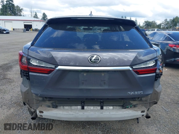 2016 Lexus RX 350 z VIN 2T2BZMCA7GC020199, wystawiony jako IAAI lot #42526032 z przebiegiem 84 821 mil mil oraz . Historia ofert i sprzedaży dostępna na DreamBid. Obrazek 17.