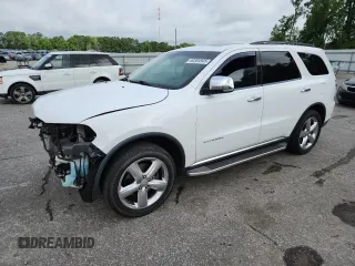 2013 Dodge Durango Citadel with VIN 1C4RDHEG6DC658958, listed as a Copart auction lot 60304945 with 209,250 mi miles and Salvage title. Bid and sale history available at DreamBid. Image 1.