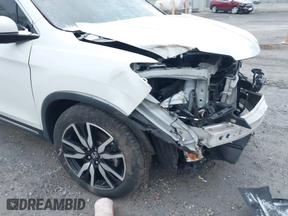 2020 Honda Pilot Touring 8-Passenger with VIN 5FNYF6H96LB056229, listed as a IAAI auction lot 41738249 with 65,099 mi miles and . Bid and sale history available at DreamBid. Image 19.