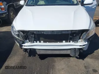 2015 Volvo V60 T5 Drive-E Premier with VIN YV140MEBXF1196500, listed as a IAAI auction lot 41848567 with 159,015 mi miles. Bid and sale history available at carsss.com. Image 6.