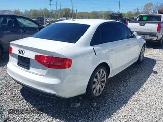 2016 Audi A4 Premium with VIN WAUAFAFLXGA012927, listed as a IAAI auction lot 41801153 with 131,660 mi miles. Bid and sale history available at carsss.com. Image 4.