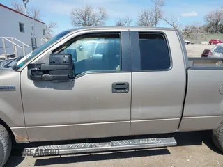 2005 Ford F-150 XLT with VIN 1FTPX14525NA78019, listed as a IAAI auction lot 41932381 with 170,153 mi miles. Bid and sale history available at carsss.com. Image 14.
