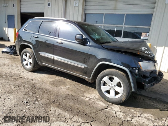 2012 Jeep Grand Cherokee Laredo with VIN 1C4RJEAG2CC215525, listed as a Copart auction lot 51876105 with 148,659 mi miles and Salvage Title. Bid and sale history available at carsss.com. Image 4.