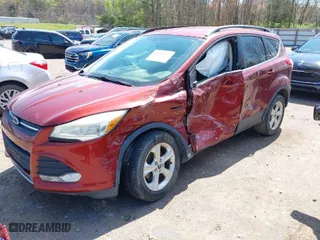 2014 Ford Escape SE with VIN 1FMCU0GX0EUB54675, listed as a IAAI auction lot 41865057 with 145,632 mi miles. Bid and sale history available at carsss.com. Image 6.