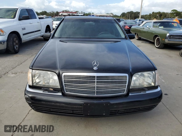 1998 Mercedes-Benz S-Class with VIN WDBGA51G6WA384615, listed as a Copart auction lot 77258814 with 0 mi miles and Salvage Title. Bid and sale history available at carsss.com. Image 5.