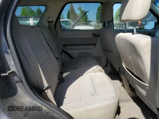 2011 Ford Escape XLT z VIN 1FMCU9DG7BKC39271, wystawiony jako Copart lot #55880445 z przebiegiem 202 072 mil mil oraz Szkoda całkowita • Salvage title. Historia ofert i sprzedaży dostępna na DreamBid. Obrazek 11.