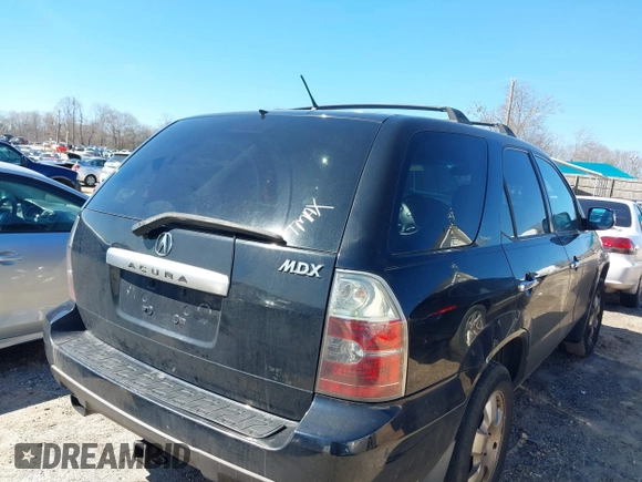 2004 Acura MDX with VIN 2HNYD18254H540684, listed as a IAAI auction lot 41584464 with 344,728 mi miles. Bid and sale history available at carsss.com. Image 4.