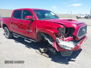 2018 Toyota Tacoma SR5 with VIN 3TMAZ5CN3JM076941, listed as a IAAI auction lot 42508412 with 122,916 mi miles and . Bid and sale history available at DreamBid. Image 1.