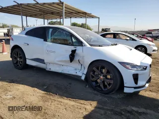 2019 Jaguar I-Pace SE z VIN SADHC2S19K1F68022, wystawiony jako Copart lot #77405114 z przebiegiem Nie podano mil oraz Szkoda całkowita • Salvage title. Historia ofert i sprzedaży dostępna na DreamBid. Obrazek 4.