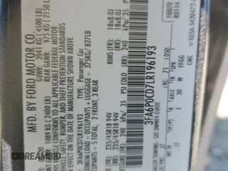 2020 Ford Fusion SEL z VIN 3FA6P0CD7LR196193, wystawiony jako Copart lot #53254465 z przebiegiem 79 944 mil mil oraz Szkoda całkowita • Salvage title. Historia ofert i sprzedaży dostępna na DreamBid. Obrazek 12.