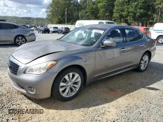 2011 Infiniti M with VIN JN1BY1APXBM325191, listed as a Copart auction lot 74209614 with 136,662 mi miles and Salvage Title. Bid and sale history available at DreamBid. Image 1.