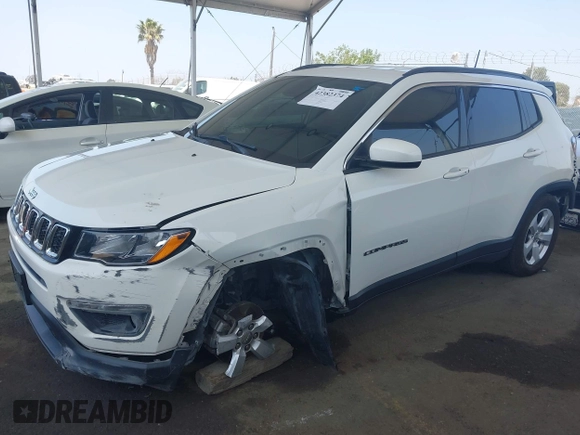 2020 Jeep Compass Latitude with VIN 3C4NJCBB8LT141375, listed as a IAAI auction lot 42382374 with 63,799 mi miles and . Bid and sale history available at DreamBid. Image 2.