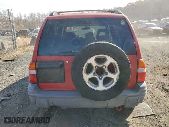 2004 Chevrolet Tracker ZR2 z VIN 2CNBJ734X46910549, wystawiony jako Copart lot #80849894 z przebiegiem Nie podano mil oraz Szkoda całkowita • Salvage title. Historia ofert i sprzedaży dostępna na DreamBid. Obrazek 6.