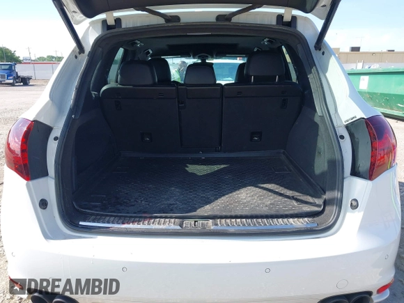 2013 Porsche Cayenne GTS with VIN WP1AD2A25DLA77759, listed as a IAAI auction lot 42316241 with 212,034 mi miles and . Bid and sale history available at DreamBid. Image 16.