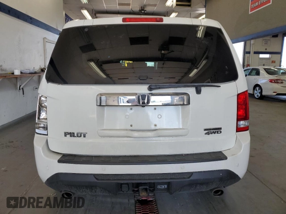 2014 Honda Pilot Touring z VIN 5FNYF4H99EB011079, wystawiony jako Copart lot #57869765 z przebiegiem Nie podano mil oraz Szkoda całkowita • Salvage title. Historia ofert i sprzedaży dostępna na DreamBid. Obrazek 6.