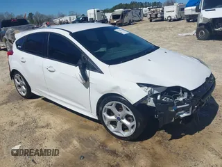 2014 Ford Focus ST with VIN 1FADP3L99EL311771, listed as a IAAI auction lot 41419521 with 124,572 mi miles and . Bid and sale history available at carsss.com. Image 1.