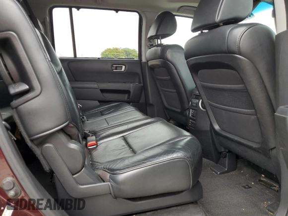 2011 Honda Pilot Touring z VIN 5FNYF3H92BB039165, wystawiony jako Copart lot #59596105 z przebiegiem 182 944 mil mil oraz Szkoda całkowita • Salvage title. Historia ofert i sprzedaży dostępna na DreamBid. Obrazek 11.