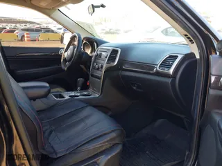 2012 Jeep Grand Cherokee Laredo with VIN 1C4RJFAG5CC118826, listed as a IAAI auction lot 42039801 with 158,153 mi miles. Bid and sale history available at carsss.com. Image 5.