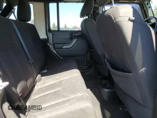 2018 Jeep Wrangler JK Unlimited Sport S with VIN 1C4HJWDG7JL929337, listed as a Copart auction lot 69376174 with 101,313 mi miles and Salvage Title. Bid and sale history available at carsss.com. Image 11.